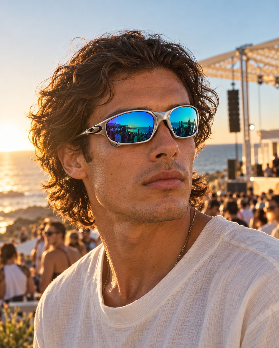 Festival-goer in mirrored sunglasses in afternoon sunshine